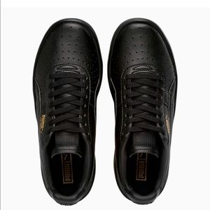 Puma GV in black, kids sz 4.5